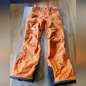 MENS XSmall Northface snowboard pants. Color is burnt orange.